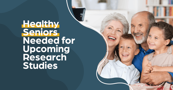 Grandparents holding grandkids, healthy senior research studies